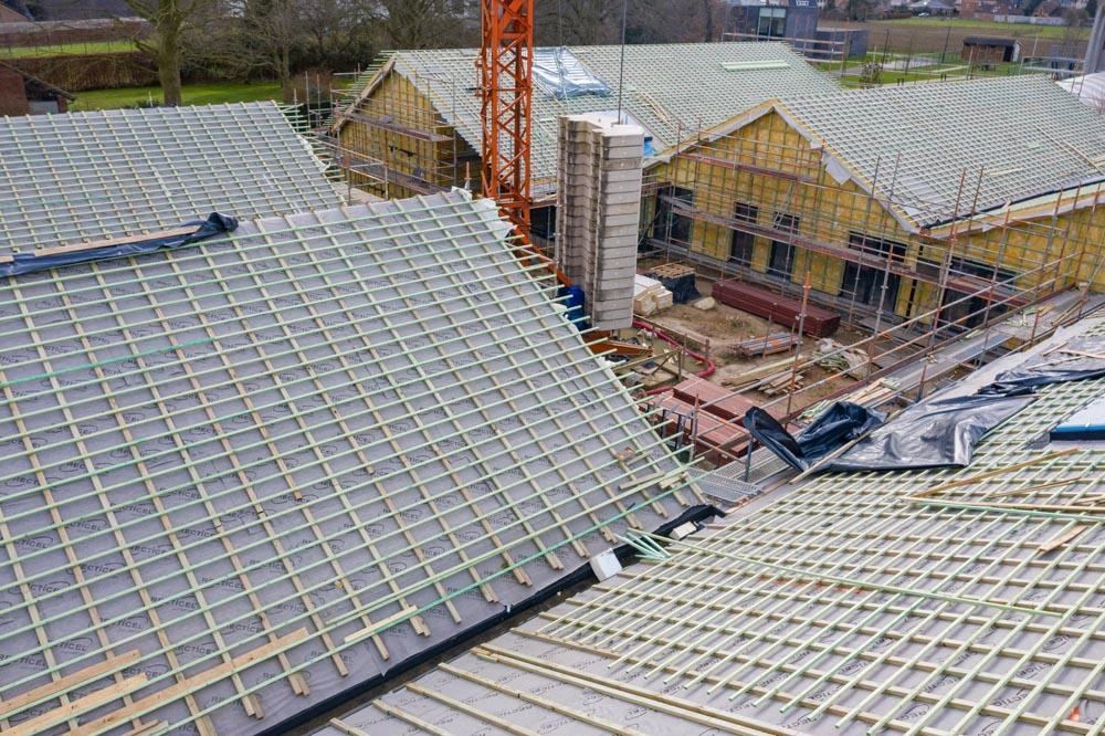 Nouveau projet de construction Ubuntu à Avelgem isolé avec isolation de toiture inclinée Powerroof Max